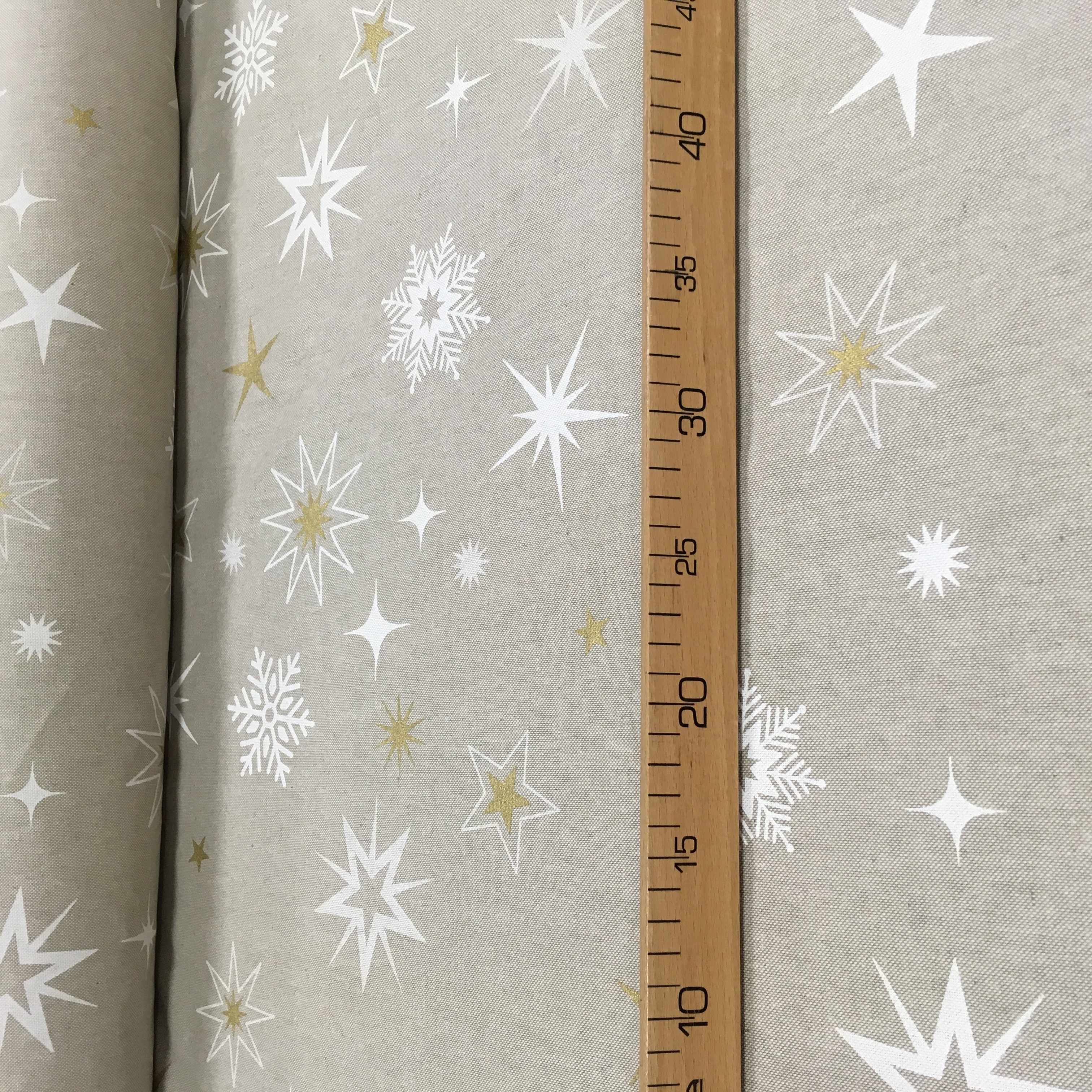 Linenlook dekoratiivkangas Kuldsed tähed