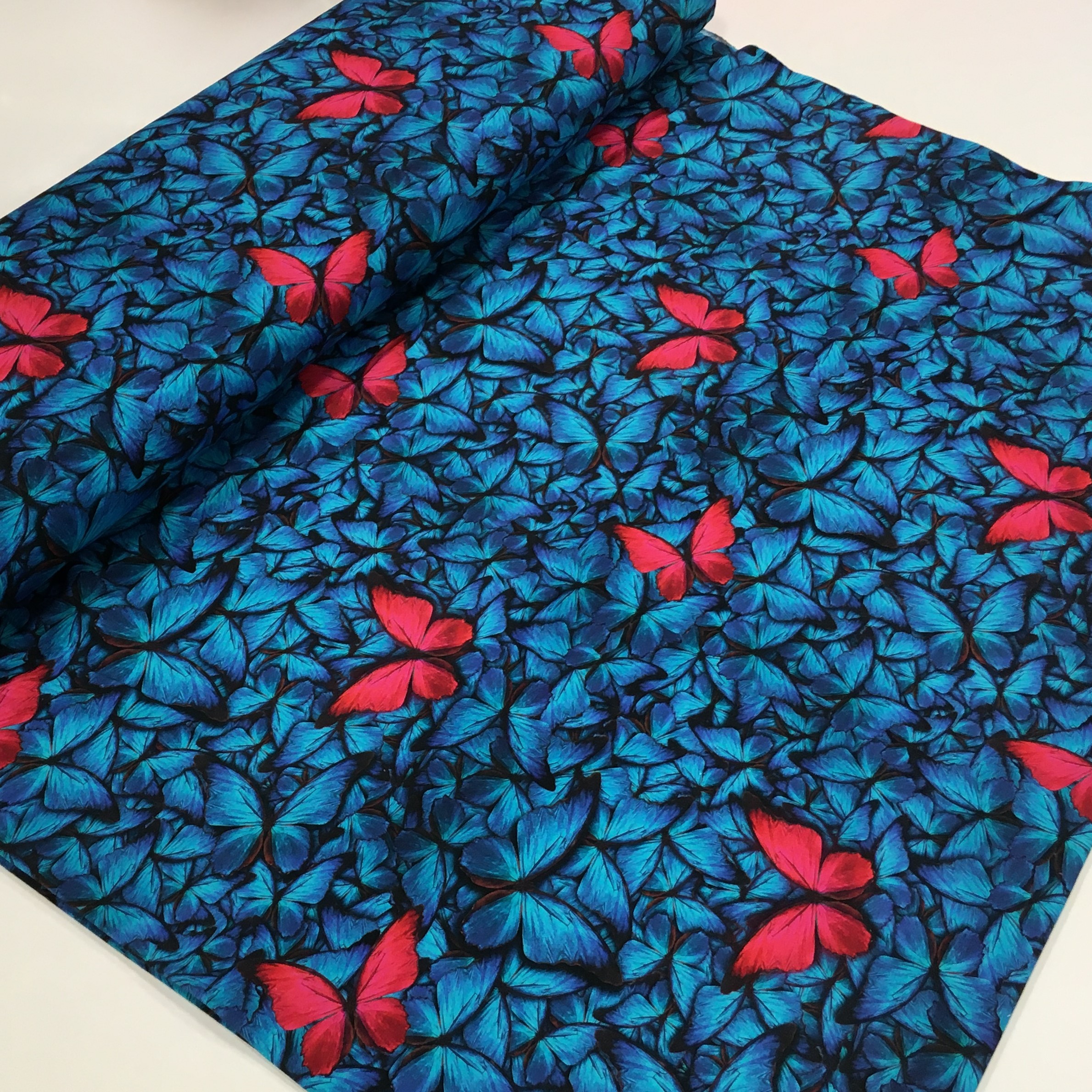 Trikotaaž Butterflies blue, digiprint