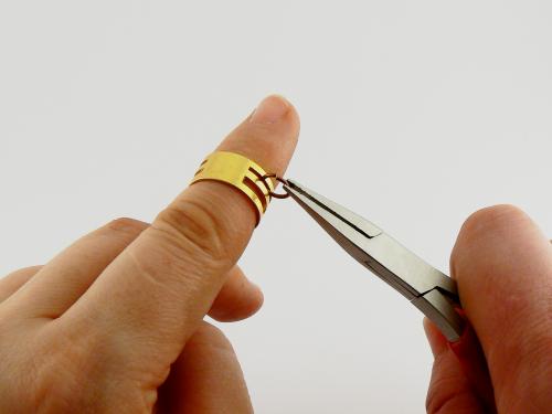 Sõrmus metallrõngaste avamiseks /sulgemiseks