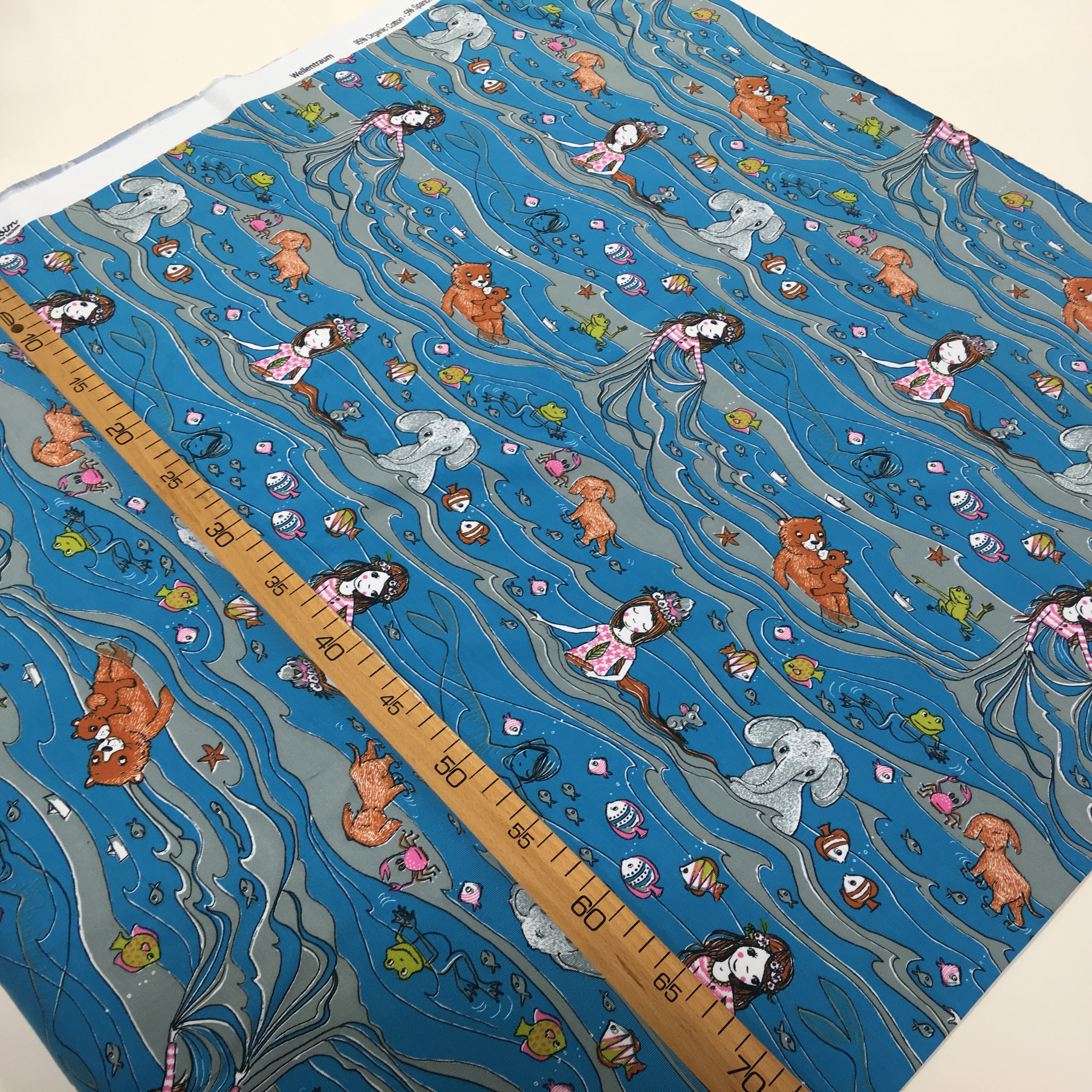 Biopuuvillane trikotaaž Unistus lainetes