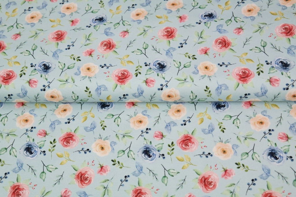 Trikotaaž Väiksed lilled helesininsel, digital print