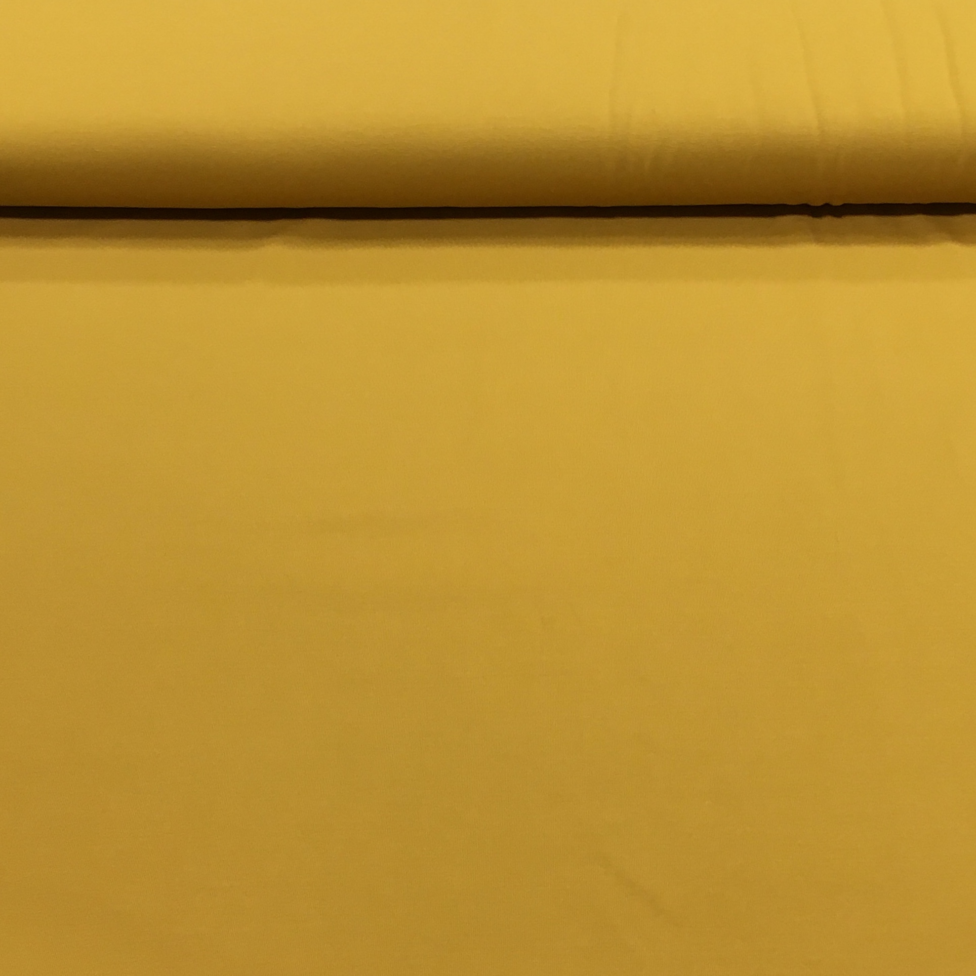 Trikotaaž ookerkollane